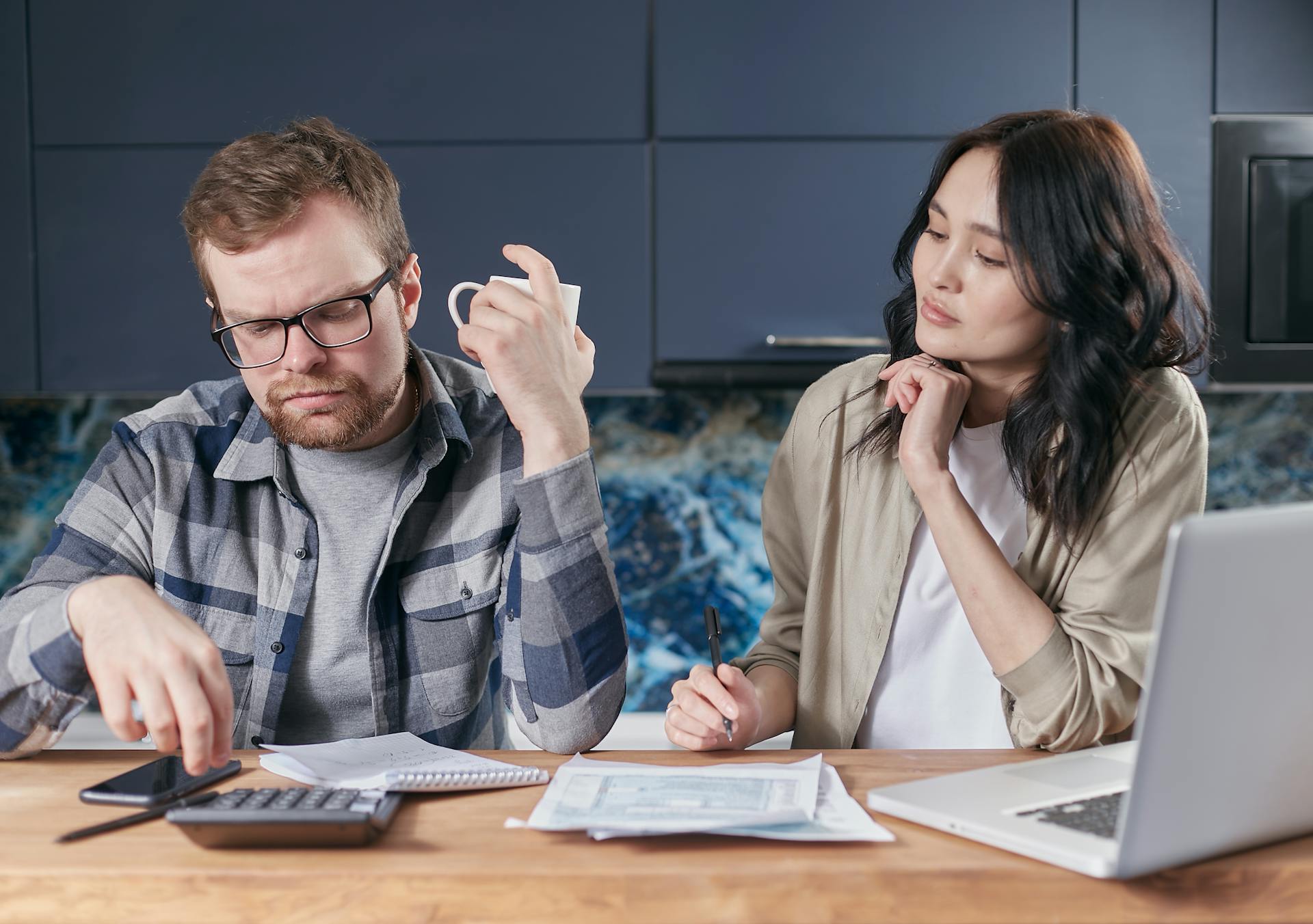 Couple reviewing their budget