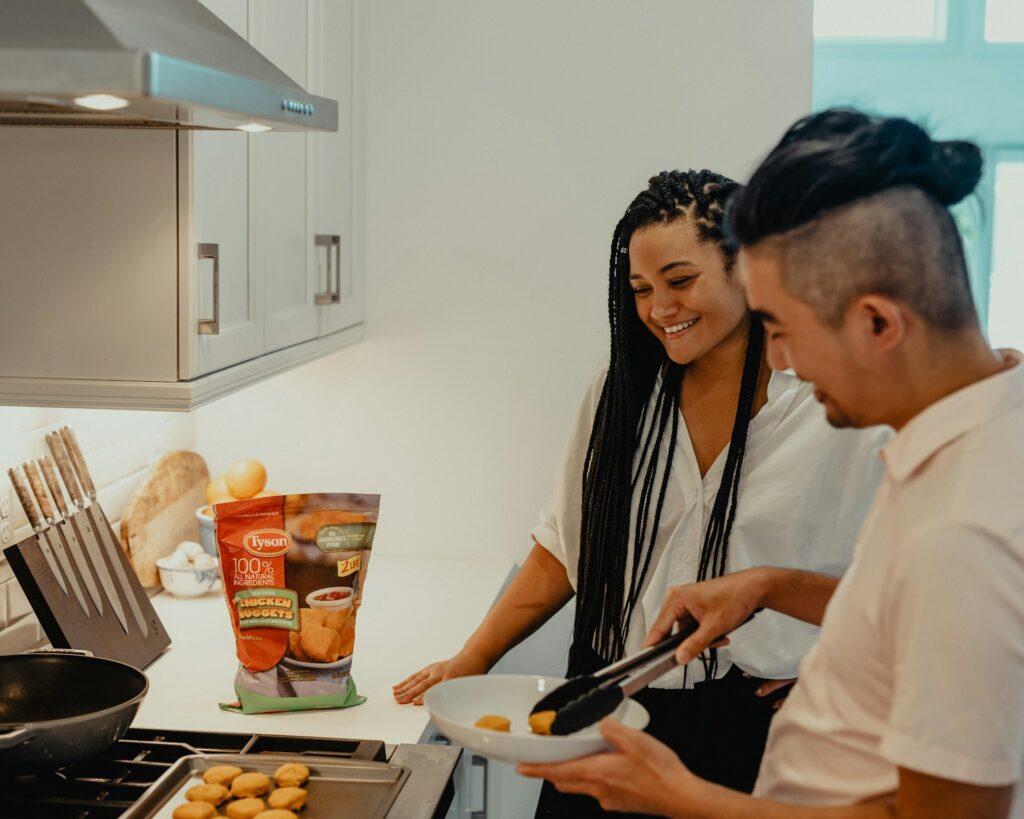 Couple preparing food in a kitchen